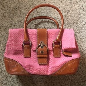 Bright pink and saddle brown leather Coach bag